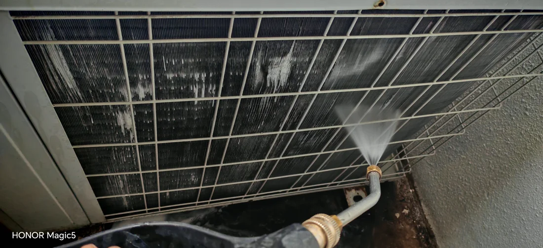 Cleaning an air conditioning coil with water